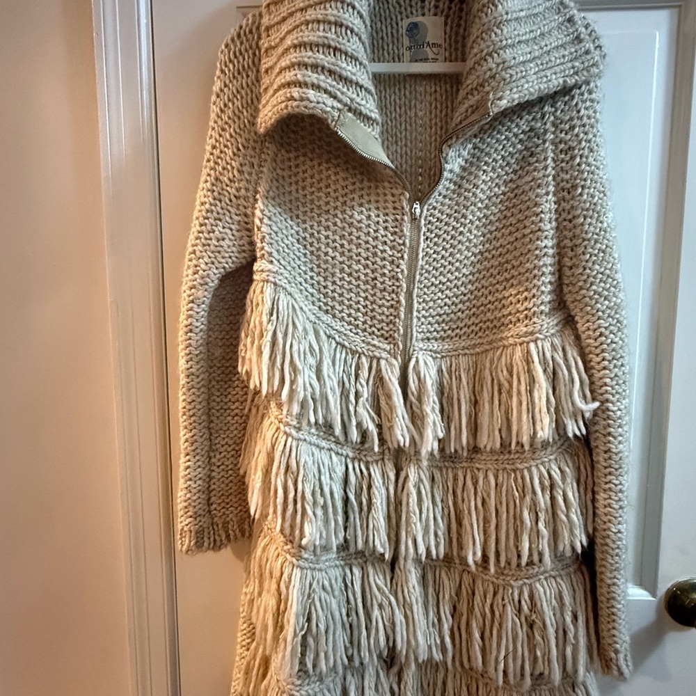 Cozy Cream Knit Cape with Fringe